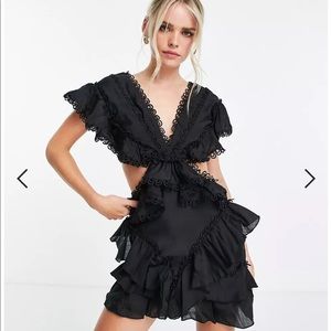 ASOS DESIGN Petite lace trim structured mini dress with ruffle detail in black